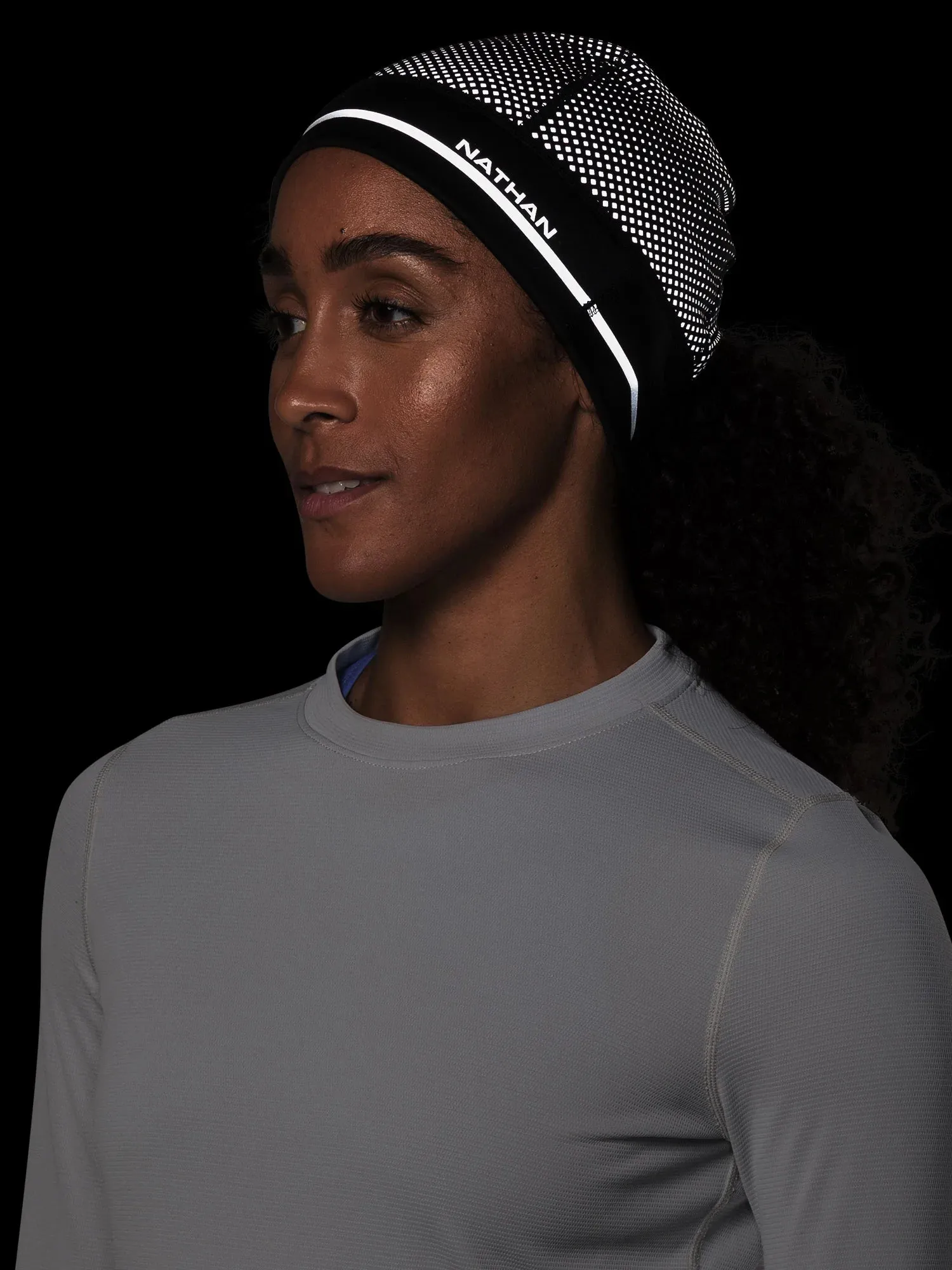 Nathan | HyperNight Reflective Ponytail Beanie | Black/Geo Print